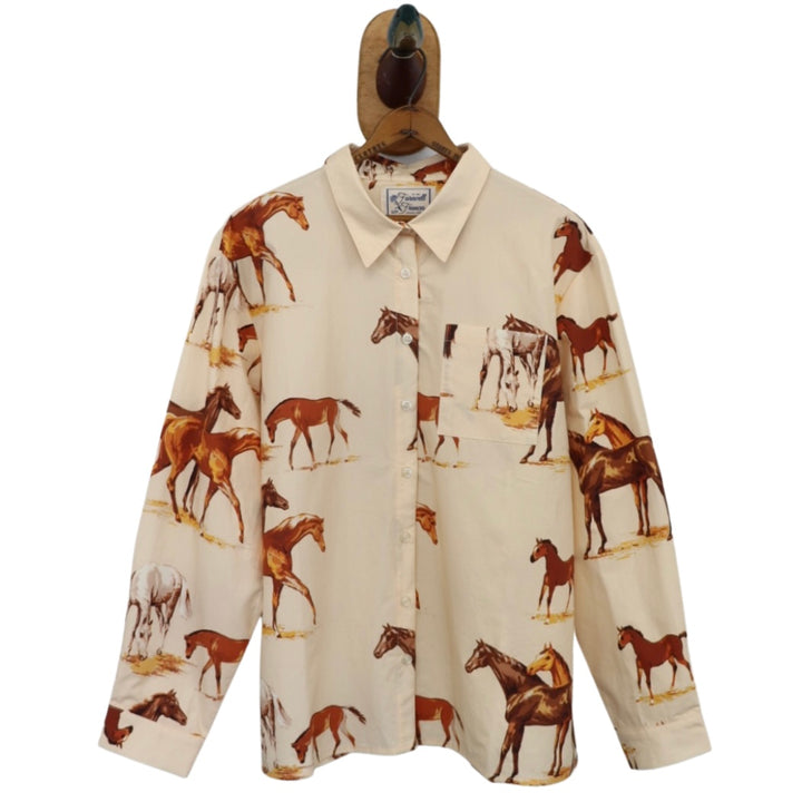 Chemise boutonnée à manches bulles et découpes exquises en blanc